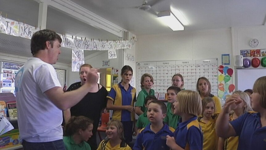 Opera singers work with children at a school in outback Qld in September, 2013