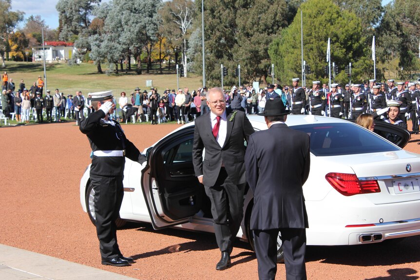 Prime Minister Scott Morrison exits a car in Canberra.
