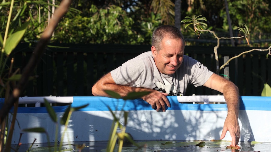 A man with a pond