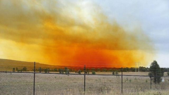 A dust plume over Muswellbrook after an explosion at BHP Billiton's Mt Arthur coal mine in February 2014.