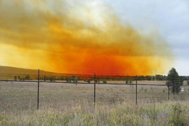 A dust plume over Muswellbrook after an explosion at BHP Billiton's Mt Arthur coal mine.