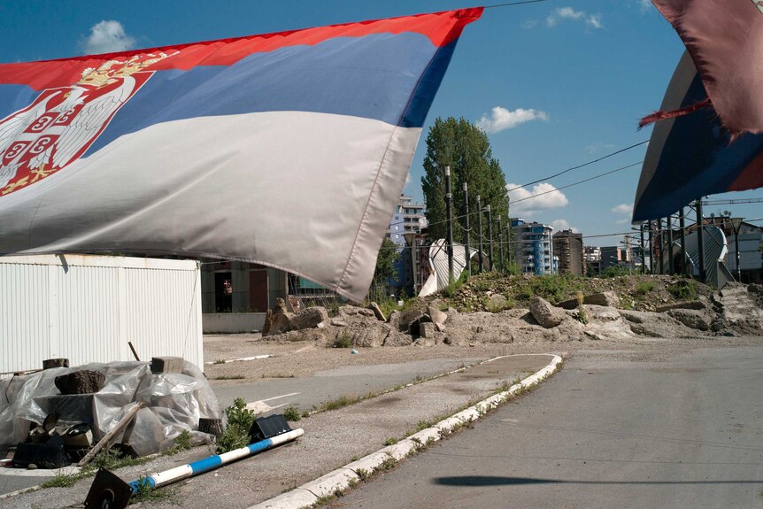 Rubble blockades the bridge from Kosovo's Serb community in the north of Mitrovica to the Albanian community in the south.