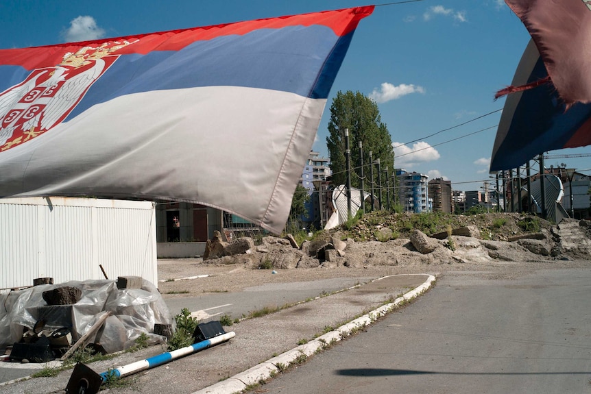 Rubble blockades the bridge from Kosovo's Serb community in the north of Mitrovica to the Albanian community in the south.