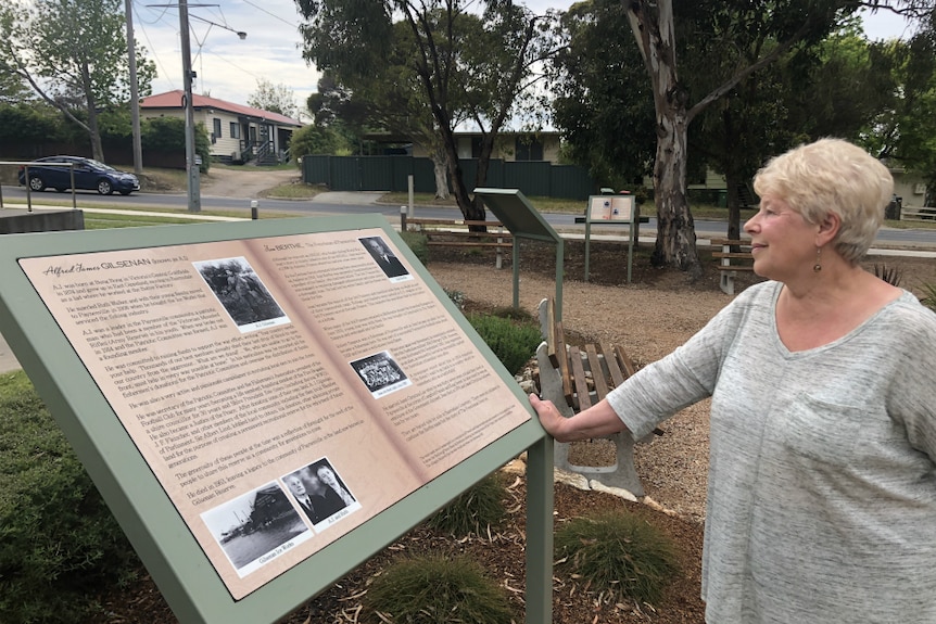 Sandra Hargreaves stands at the Paynesville Cenotaph.