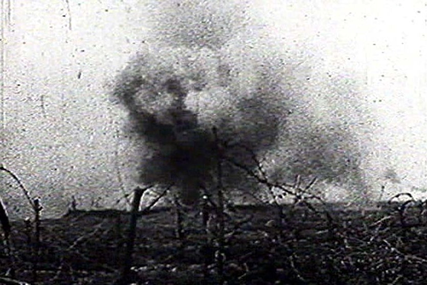 A shell explodes on the battlefield at Fromelles.