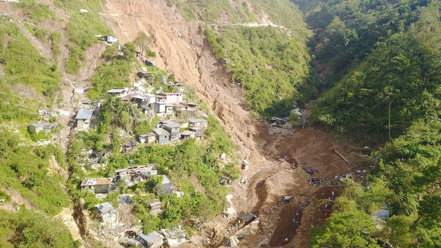 The side of a hill where a landslide trapped people in the Philippines.