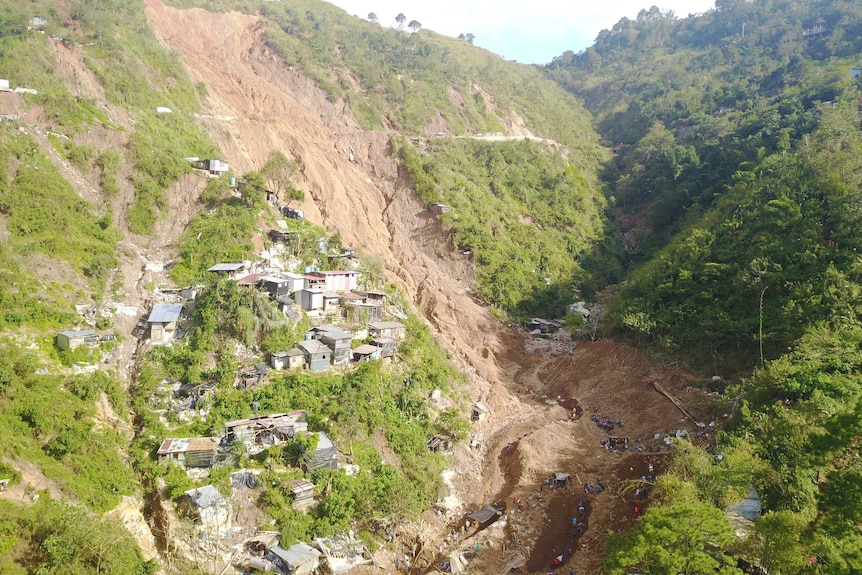 The side of a hill where a landslide trapped people in the Philippines.