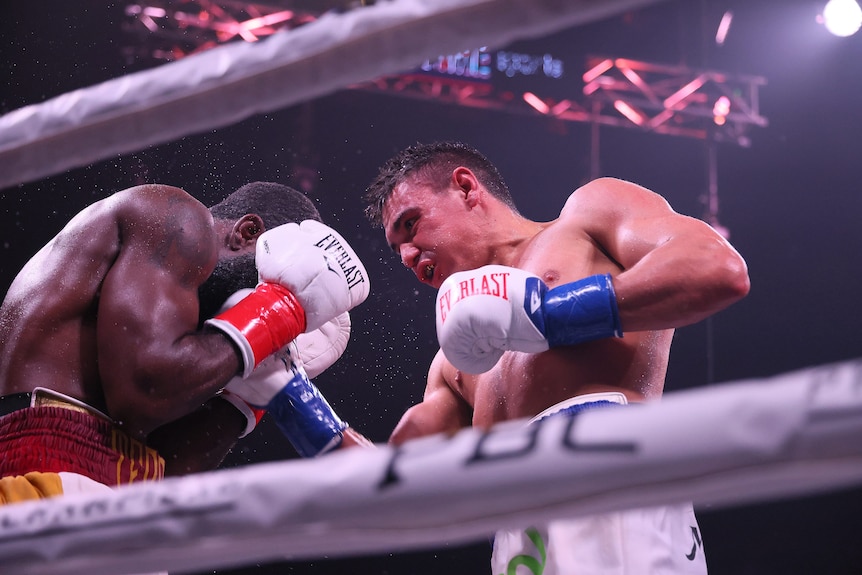 Tim Tszyu grimaces as he punches Terrell Gausha