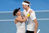 Laura Siegemund and Alexander Zverev celebrate winning a mixed doubles rubber at the United Cup.