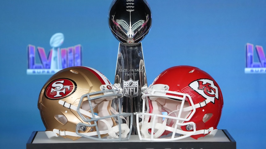 Helmets for the San Francisco 49ers and Kansas City Chiefs on display with the Vince Lombardi Trophy 