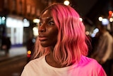 A scene from the TV series I May Destroy You with Michaela Coel, it's night and she's out on a London street