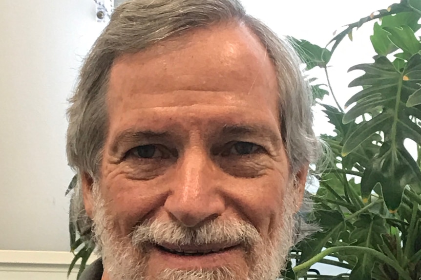 A close up portrait of a man's face