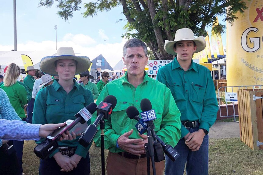 AgForce CEO Michael Guerin with local farmers Bonnie Maynard and Lachlan Collins.