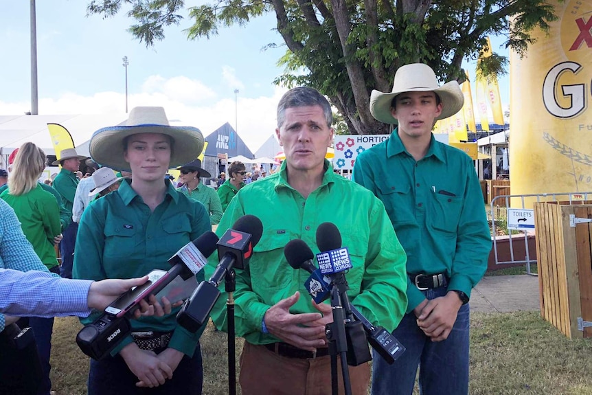 AgForce CEO Michael Guerin with local farmers Bonnie Maynard and Lachlan Collins.