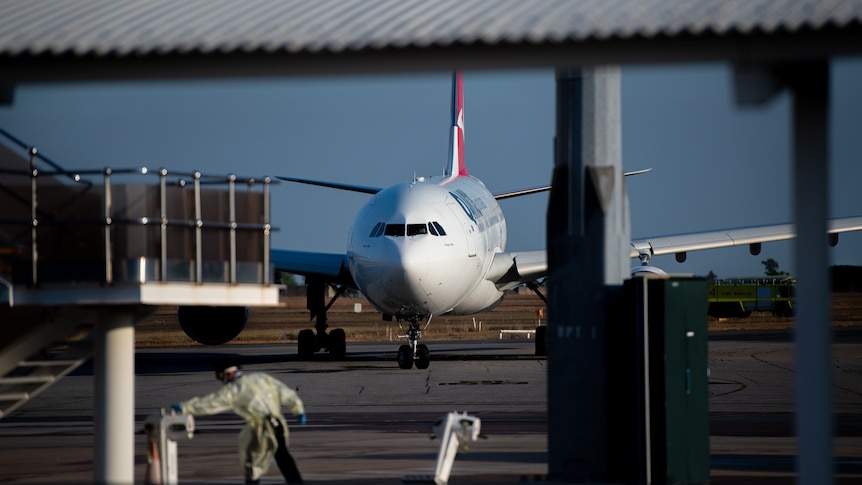 A Qantas plane on the tarmac at Darwin International Airport.