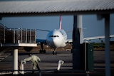 A Qantas plane on the tarmac at Darwin International Airport.