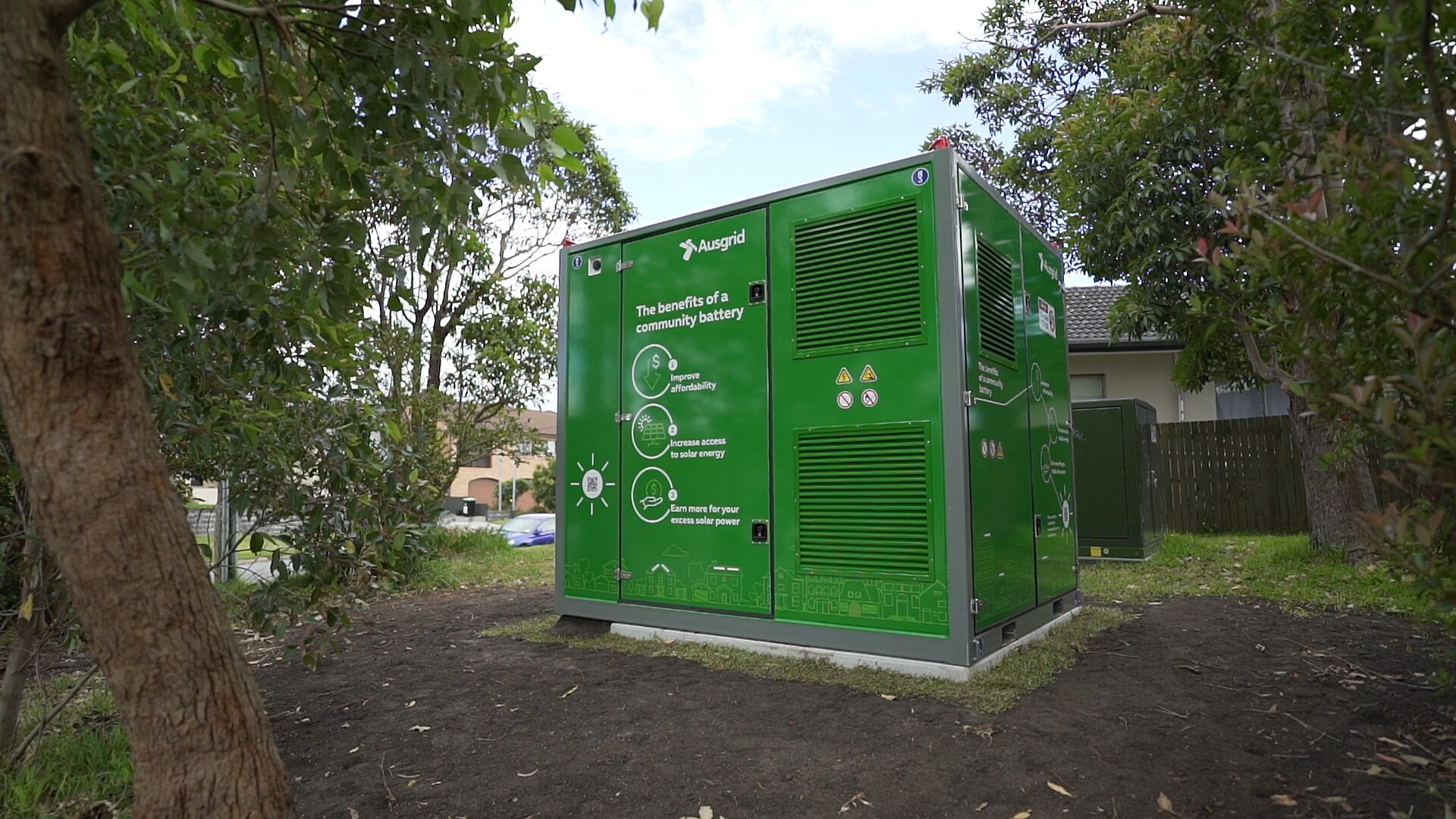 a green battery about the size of a shipping container