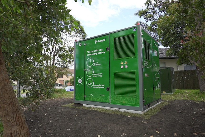 a green battery about the size of a shipping container