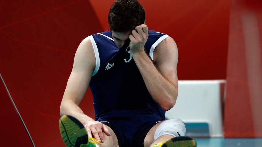 Australia's Nathan Roberts shows his dejection after they lost to Bulgaria in the volleyball.