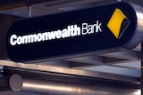 Commonwealth Bank signs hang from a Brisbane building
