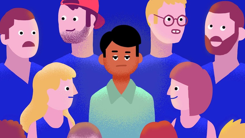 An illustration shows a man with brown skin surrounded by white people.