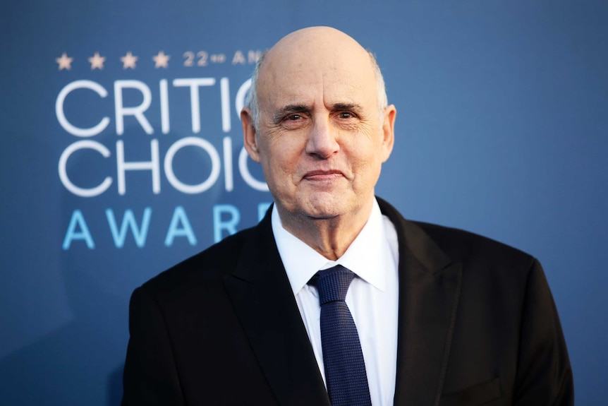 Actor Jeffrey Tambor poses on the red carpet.