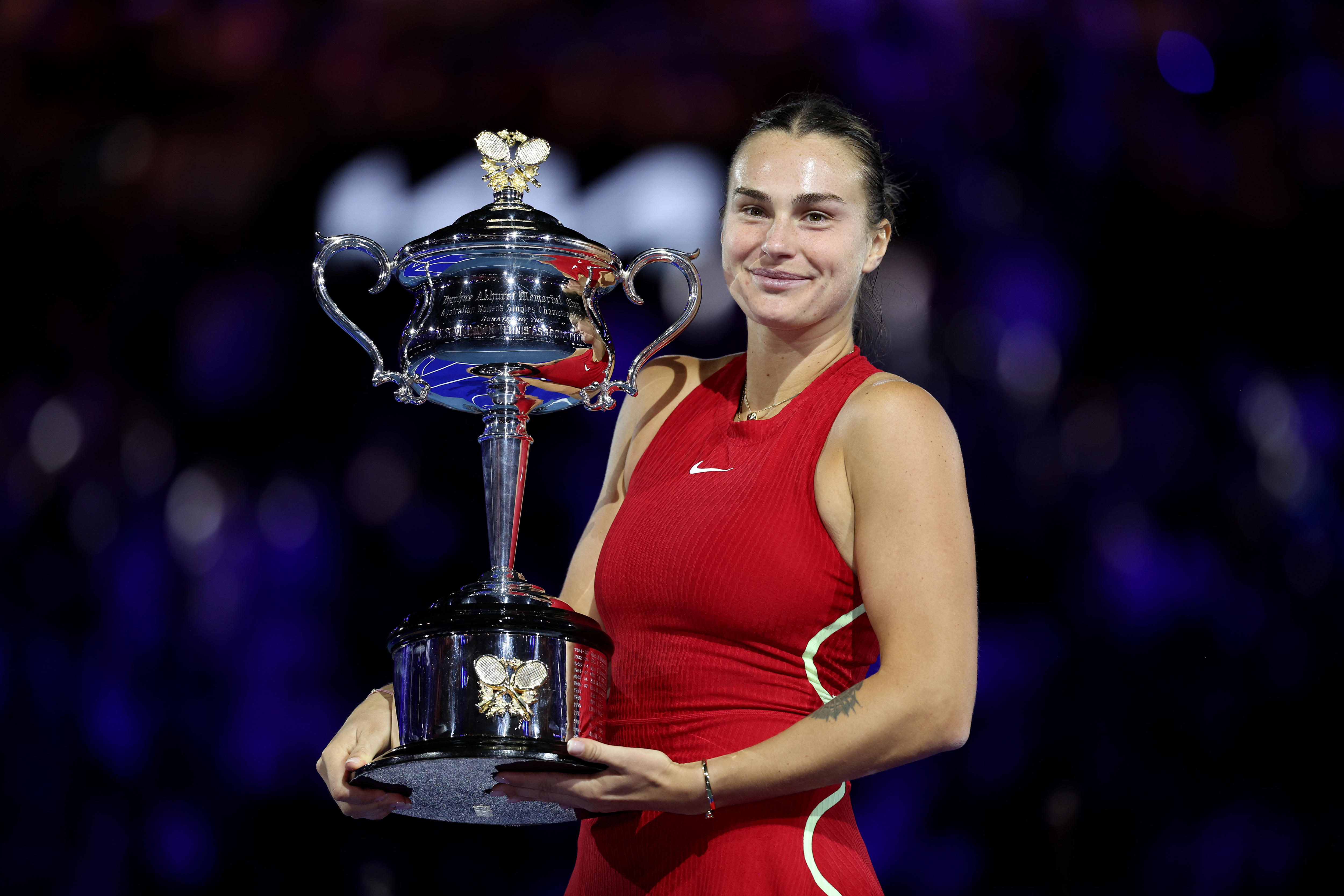 Aryna Sabalenka holds the Australian Open trophy.