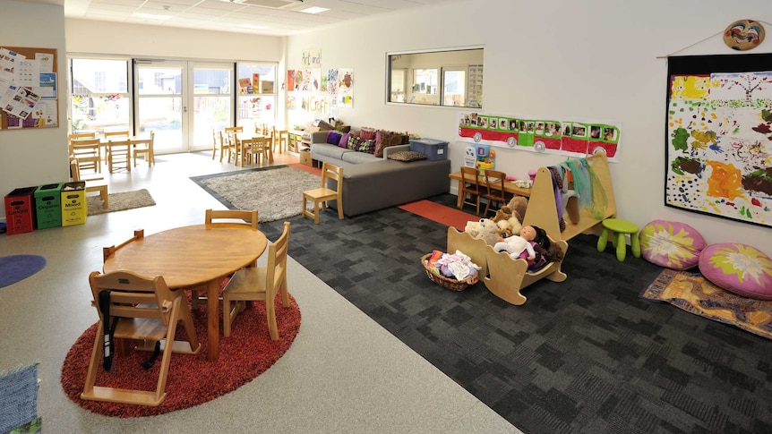 A room showing toys and play equipment for young children.
