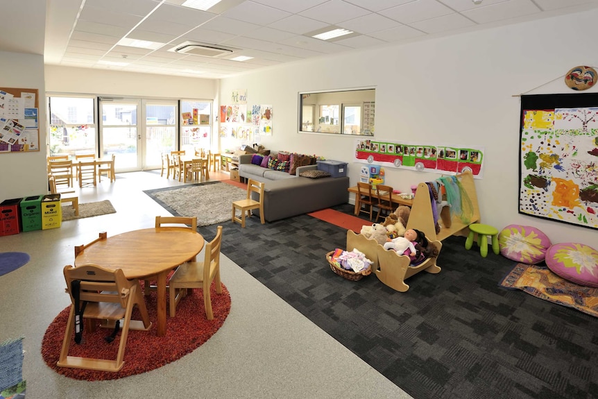 A room showing toys and play equipment for young children.