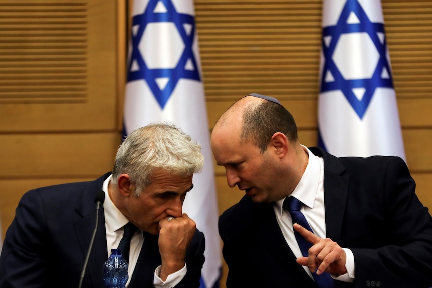 Naftali Bennett and Yair Lapid at Israeli Cabinet meeting