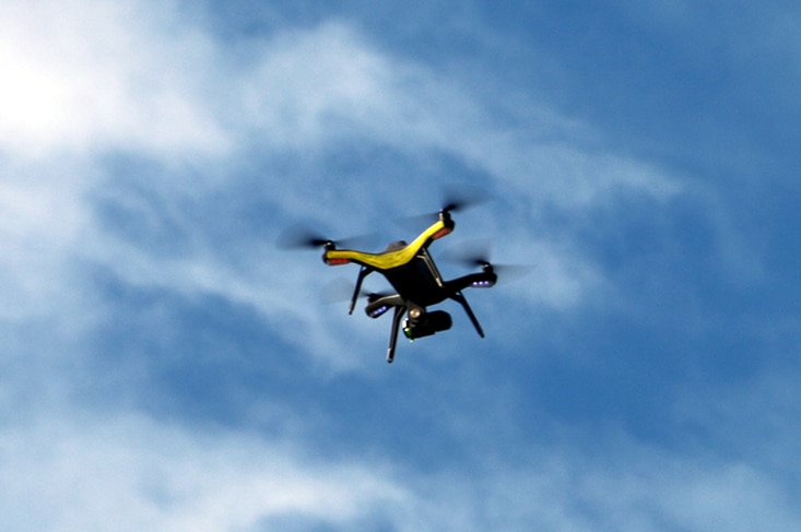 A drone hovers in the sky above Darwin.