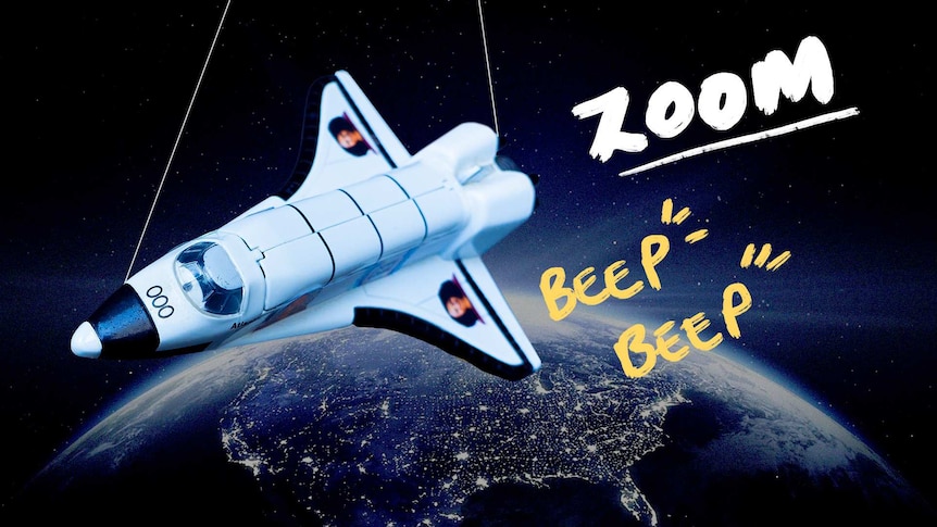 Model space shuttle suspended by wire above a picture of space and 'zoom', 'beep beep' written on it.
