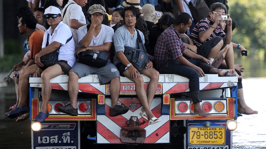 Truck takes locals through flooded Bangkok