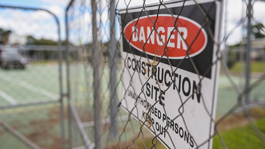 Construction site sign at Rocklea State School which is undergoing works after being flooded in February 2022