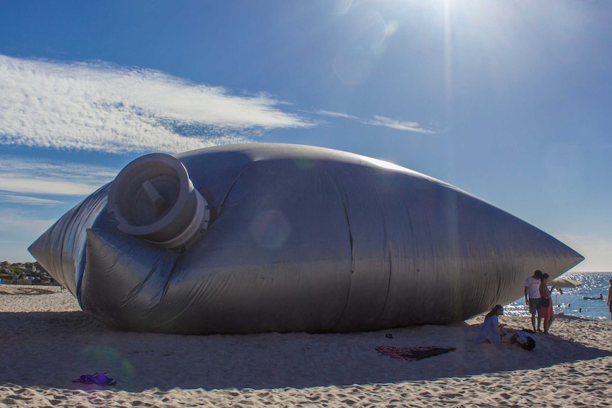 A giant inflatable goon bag on display at WA's 2014 Sculpture by the Sea exhibition.