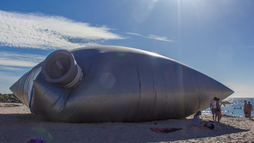 A giant inflatable goon bag on display at WA's 2014 Sculpture by the Sea exhibition.
