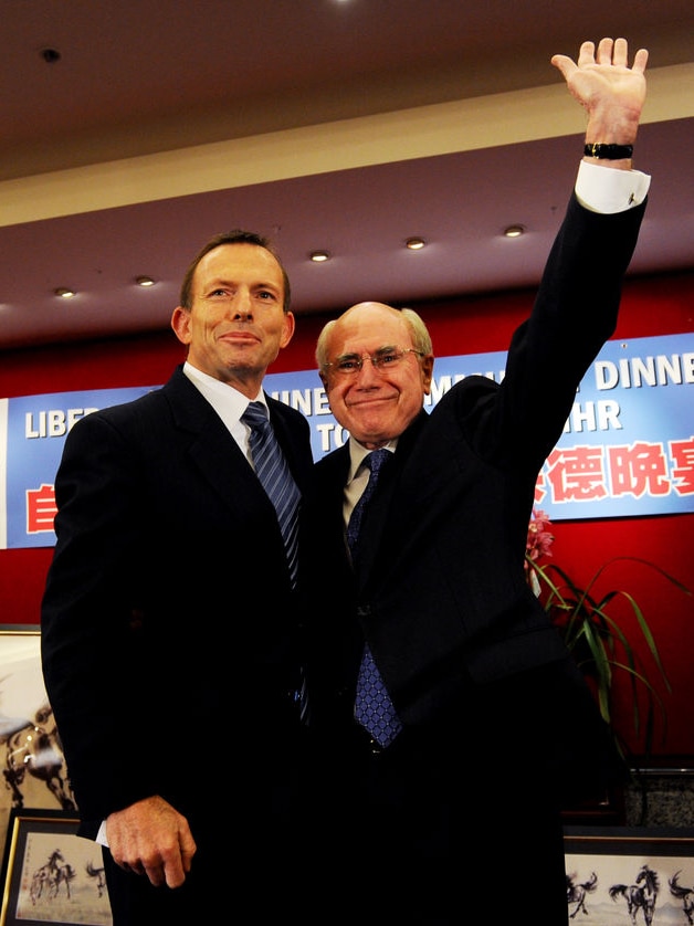 Opposition Leader Tony Abbott (left) and former prime minister John Howard.