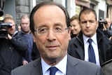 Hollande arrives to cast his vote
