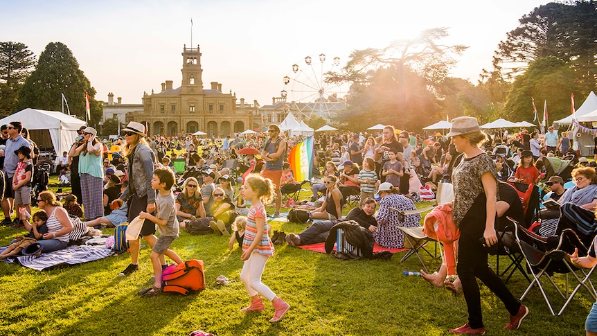 Crowds enjoying the Lost Lands festival on the lawns of Werribee Mansion