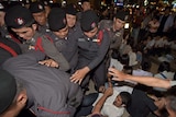 Thai police arrest students protesting military rule
