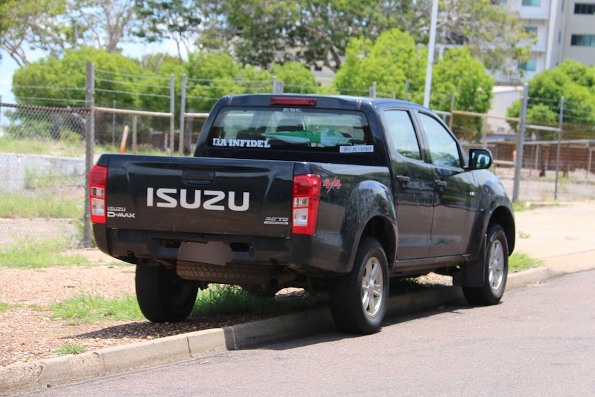 A car mounting a kerb.