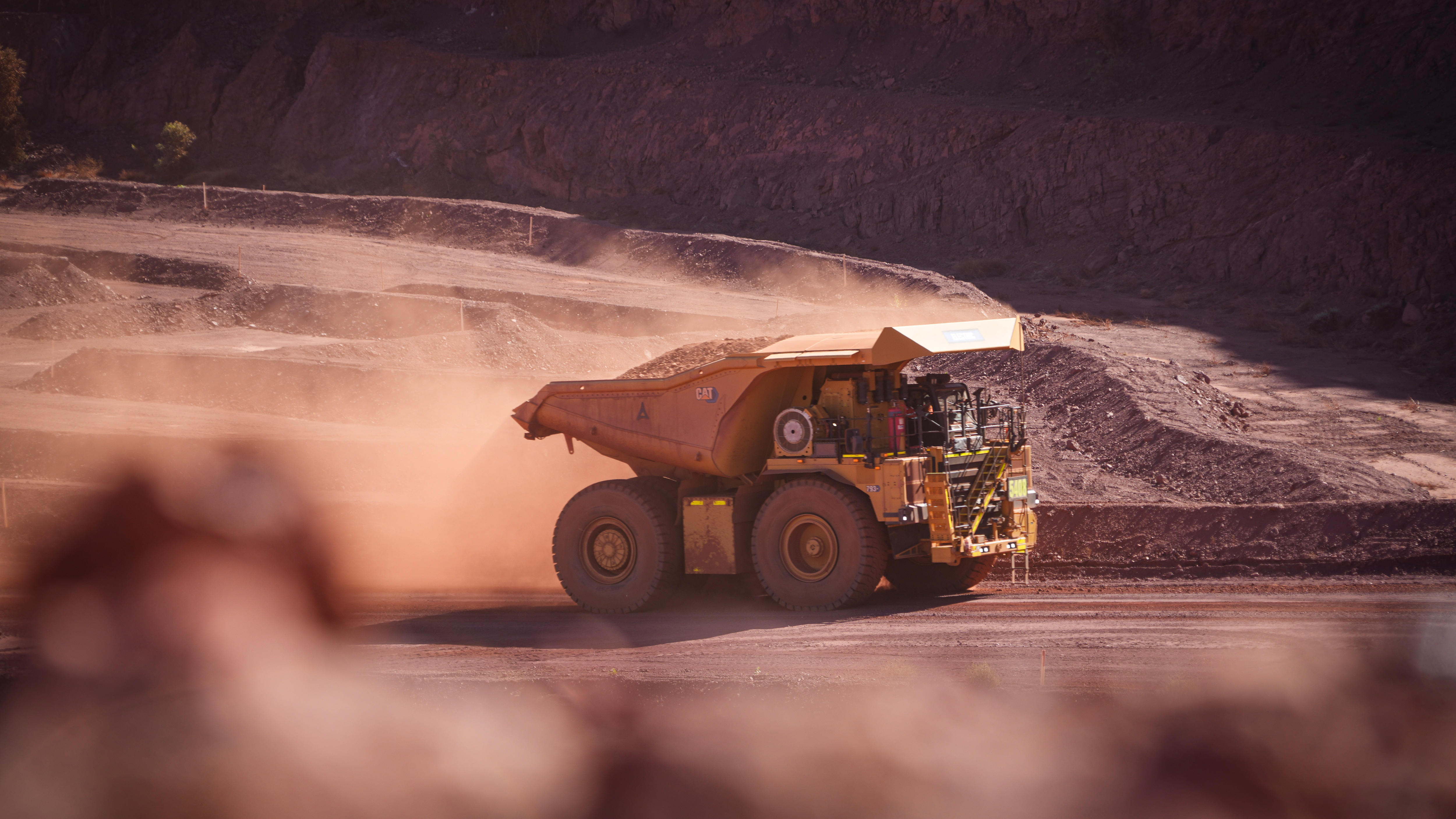 Wide image of a large mining dump truck.