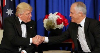 Donald Trump and Malcolm Turnbull shake hands.