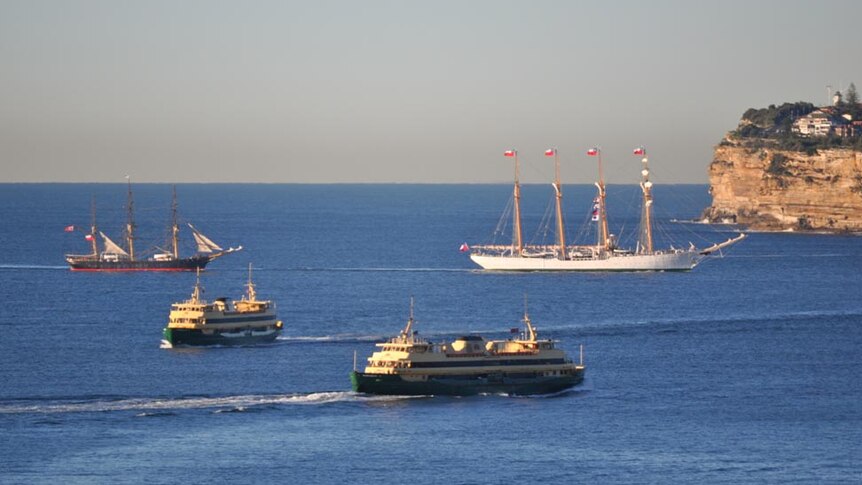 The Esmeralda is escorted into Sydney Harbour.