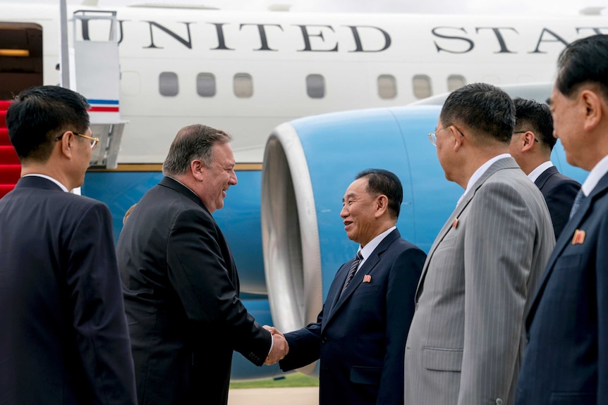 Mike Pompeo shakes hands with Kim Yong Chol