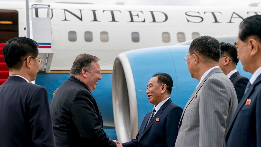 Mike Pompeo shakes hands with Kim Yong Chol