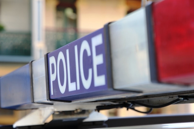 Blue and red lights on top of a police car