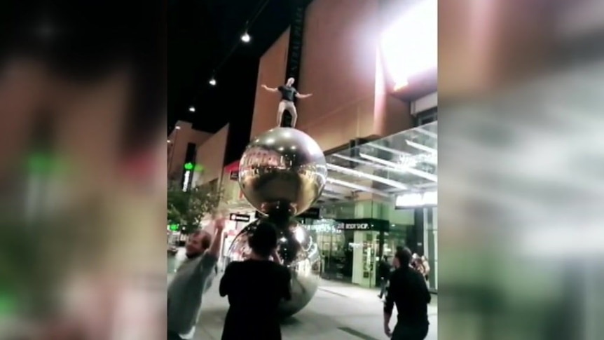 ‘Reckless’ daredevil jumps onto Adelaide’s famous Mall's Balls