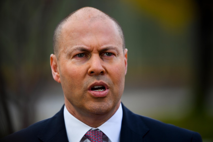 Josh Frydenberg opens his mouth to speak