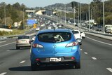 A car on the Pacific Motorway